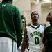 Huron junior Antonio Henry looks at the scoreboard after fouling out of the game on Friday, March 8. Daniel Brenner I AnnArbor.com